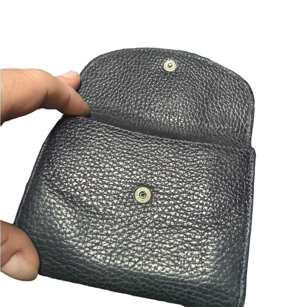 Dark navy leather wallet with exterior coin compartment. GUC